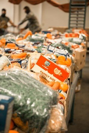 The food boxes contained a variety of fruits, vegetables, crackers, meats and breads.