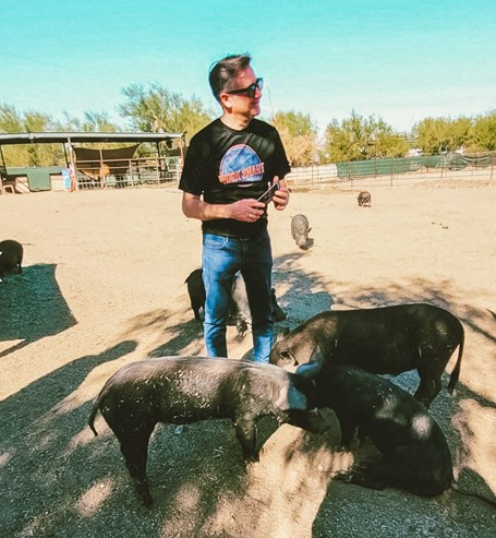 Sean Rogers enjoys volunteering with LAVIDGE IMPACT at Better Piggies Rescue.