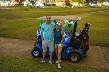 Betsey Griffin Jones, her husband and another couple participated in the golf fundraiser.